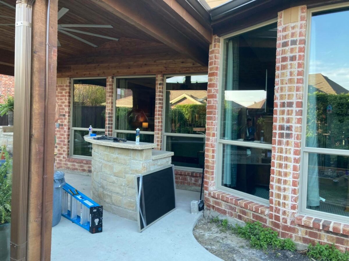 Exterior view of a home with newly installed windows
