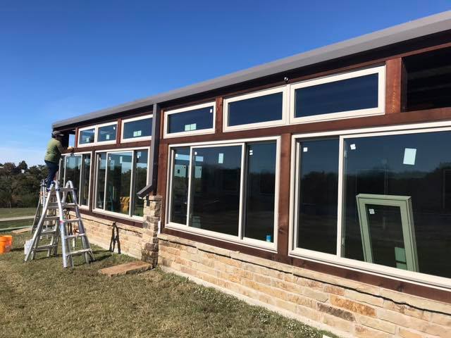 Completed window installation on the side of a house